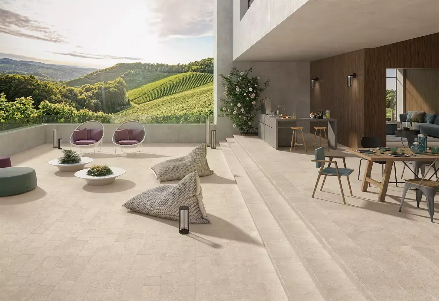 Terrasse mit beigen Feinsteinzeugfliesen in Natursteinoptik aus der MaPierre-Kollektion von Emilgroup